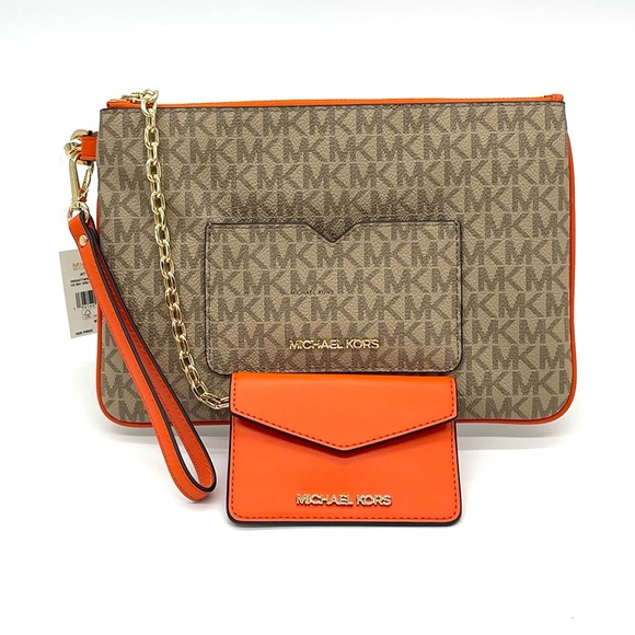 MICHAEL KORS JET SET ITEM LG 2 in
1 CARD CASE & WRISTLET - Picture 2 of 11